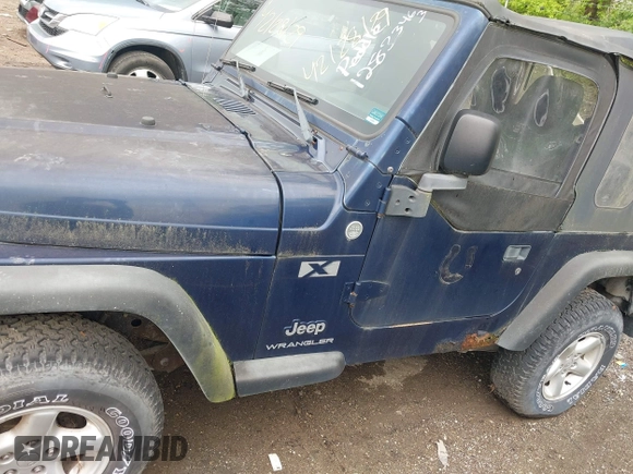 2006 Jeep Wrangler X with VIN 1J4FA39SX6P707937, listed as a IAAI auction lot 42128129 with 93,629 mi miles and . Bid and sale history available at DreamBid. Image 14.