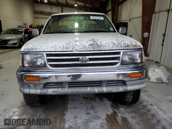 1997 Toyota T100 SR5 with VIN JT4UN24D9V0048079, listed as a Copart auction lot 87042344 with 303,785 mi miles and Salvage Title. Bid and sale history available at DreamBid. Image 5.
