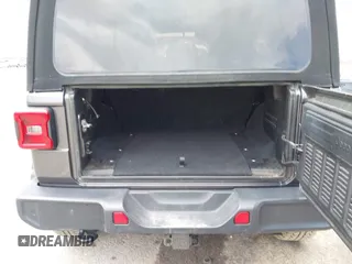 2019 Jeep Wrangler Unlimited Sahara with VIN 1C4HJXEN3KW622167, listed as a IAAI auction lot 41880702 with 72,928 mi miles and . Bid and sale history available at DreamBid. Image 18.