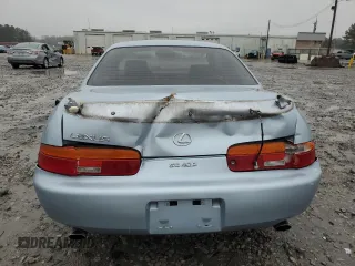 1995 Lexus SC 400 z VIN JT8UZ30CXS0039926, wystawiony jako Copart lot #89373825 z przebiegiem 252 843 mil mil oraz Szkody całkowita. Historia ofert i sprzedaży dostępna na DreamBid. Obrazek 6.