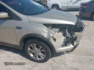 2017 Ford Escape SE z VIN 1FMCU0GD8HUC60074, wystawiony jako IAAI lot #41918443 z przebiegiem 85 787 mil mil oraz . Historia ofert i sprzedaży dostępna na DreamBid. Obrazek 18.