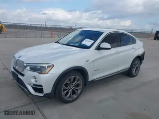 2015 BMW X4 xDrive28i with VIN 5UXXW3C53F0M88714, listed as a IAAI auction lot 41483692 with 132,054 mi miles. Bid and sale history available at carsss.com. Image 17.