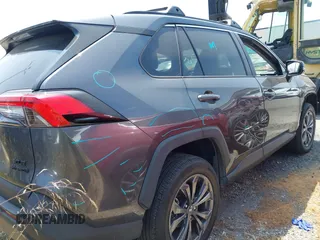 2023 Toyota RAV4 Hybrid XLE Premium with VIN 4T3B6RFV9PU117919, listed as a IAAI auction lot 42528322 with 27,236 mi miles and . Bid and sale history available at DreamBid. Image 4.