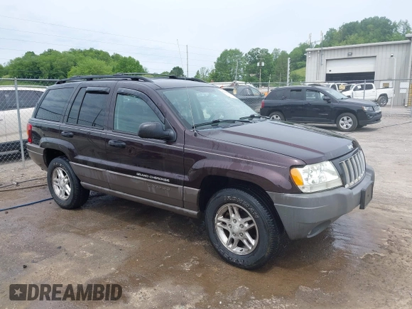 2004 Jeep Grand Cherokee Laredo z VIN 1J4GW48S94C209326, wystawiony jako IAAI lot #42309565 z przebiegiem 159 429 mil mil oraz . Historia ofert i sprzedaży dostępna na DreamBid. Obrazek 1.