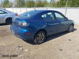 2007 Mazda Mazda3 s Touring with VIN JM1BK323171630318, listed as a IAAI auction lot 41750386 with 232,731 mi miles. Bid and sale history available at carsss.com. Image 4.