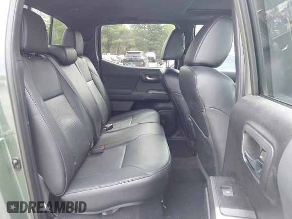 2021 Toyota Tacoma SR with VIN 3TMCZ5AN5MM380286, listed as a IAAI auction lot 42165523 with 58,965 mi miles and . Bid and sale history available at DreamBid. Image 8.