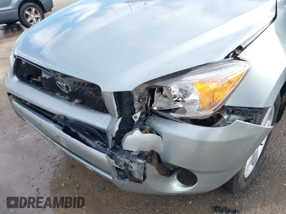 2008 Toyota RAV4 with VIN JTMBD33V985212870, listed as a IAAI auction lot 40765461 with 163,580 mi miles. Bid and sale history available at carsss.com. Image 6.