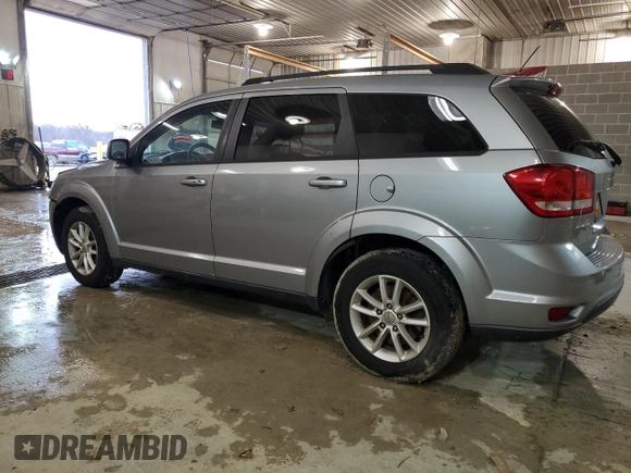 2015 Dodge Journey SXT with VIN 3C4PDCBB9FT694895, listed as a Copart auction lot 87417834 with 129,946 mi miles and Salvage Title. Bid and sale history available at carsss.com. Image 2.