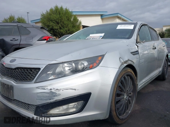 2013 Kia Optima LX with VIN KNAGM4A75D5430974, listed as a IAAI auction lot 41209055 with 197,871 mi miles. Bid and sale history available at carsss.com. Image 6.