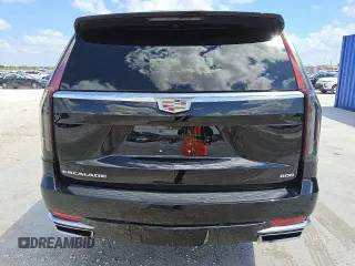 2023 Cadillac Escalade 4WD Premium Luxury z VIN 1GYS4BKL7PR332923, wystawiony jako Copart lot #57442025 z przebiegiem 56 886 mil mil oraz Tytuł czysty. Historia ofert i sprzedaży dostępna na DreamBid. Obrazek 6.