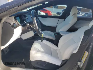 2017 Tesla Model S 100D с VIN 5YJSA1E23HF199497, выставлен на аукционе Copart как лот 51302475 с пробегом 61 993 миль миль и Списание • Salvage title. История ставок и продаж доступна на DreamBid. Изображение 7.