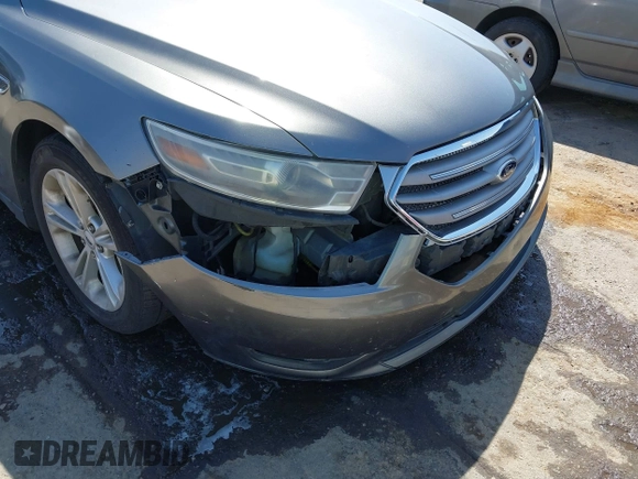 2013 Ford Taurus SEL with VIN 1FAHP2E81DG113242, listed as a IAAI auction lot 41952486 with 169,369 mi miles. Bid and sale history available at carsss.com. Image 6.
