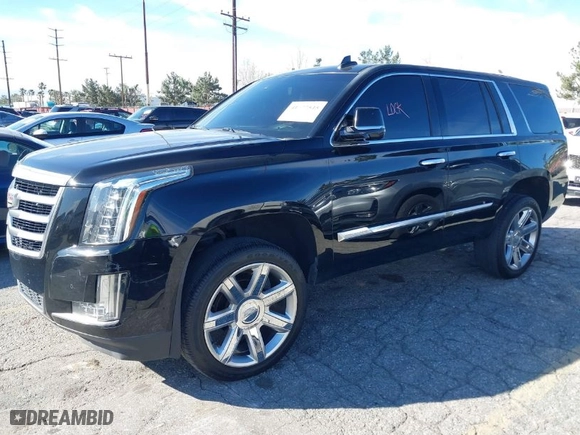 2015 Cadillac Escalade Luxury with VIN 1GYS4MKJ6FR685453, listed as a IAAI auction lot 41677545 with 149,131 mi miles. Bid and sale history available at carsss.com. Image 2.