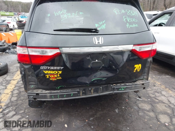 2012 Honda Odyssey EX-L with VIN 5FNRL5H64CB142247, listed as a IAAI auction lot 41722015 with 179,637 mi miles and . Bid and sale history available at carsss.com. Image 6.