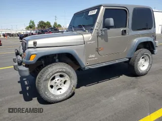 2003 Jeep Wrangler Sport z VIN 1J4FA49S43P327283, wystawiony jako Copart lot #59036295 z przebiegiem 158 108 mil mil oraz Szkoda całkowita • Salvage title. Historia ofert i sprzedaży dostępna na DreamBid. Obrazek 1.