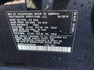 2018 Volkswagen Atlas SEL with VIN 1V2ER2CAXJC582408, listed as a IAAI auction lot 41389461 with 60,822 mi miles and . Bid and sale history available at DreamBid. Image 9.
