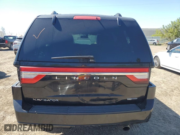 2015 Lincoln Navigator z VIN 5LMJJ2JT2FEJ03107, wystawiony jako Copart lot #56480805 z przebiegiem 176 627 mil mil oraz Czysty tytuł • Clean title. Historia ofert i sprzedaży dostępna na DreamBid. Obrazek 6.
