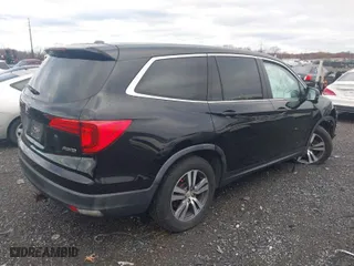 2016 Honda Pilot EX-L with VIN 5FNYF6H5XGB022913, listed as a IAAI auction lot 40914838 with 148,950 mi miles. Bid and sale history available at carsss.com. Image 4.