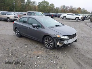 2015 Honda Civic EX-L z VIN 2HGFB2F99FH500296, wystawiony jako IAAI lot #40823393 z przebiegiem 169 634 mil mil oraz . Historia ofert i sprzedaży dostępna na DreamBid. Obrazek 1.