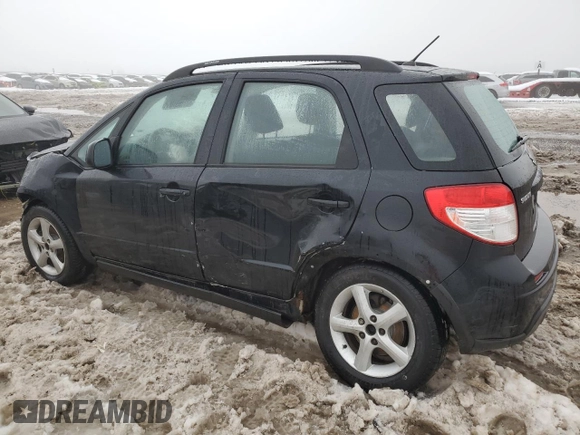 2009 Suzuki SX4 Man FWD with VIN JS2YA413996201623, listed as a Copart auction lot 84094154 with 0 mi miles and Salvage Title. Bid and sale history available at carsss.com. Image 2.