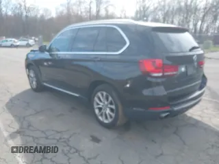 2014 BMW X5 xDrive35i with VIN 5UXKR0C57E0H20944, listed as a IAAI auction lot 42011451 with 208,205 mi miles. Bid and sale history available at carsss.com. Image 3.