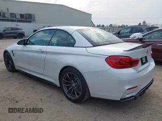 2018 BMW M4 with VIN WBS4Z9C55JED30963, listed as a IAAI auction lot 41641751 with 34,543 mi miles and . Bid and sale history available at DreamBid. Image 3.