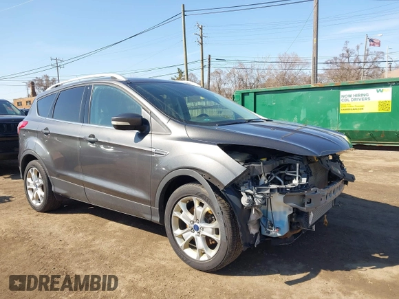 2016 Ford Escape Titanium with VIN 1FMCU9JX5GUA65412, listed as a IAAI auction lot 41859123 with 80,208 mi miles and . Bid and sale history available at DreamBid. Image 1.