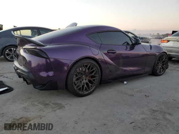 2021 Toyota GR Supra 3.0 with VIN WZ1DB0C00MW042065, listed as a Copart auction lot 83456584 with 36,410 mi miles and Salvage Title. Bid and sale history available at carsss.com. Image 3.