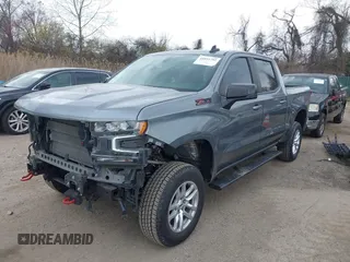2021 Chevrolet Silverado 1500 RST z VIN 3GCUYEED5MG187904, wystawiony jako IAAI lot #41891792 z przebiegiem 73 115 mil mil oraz . Historia ofert i sprzedaży dostępna na DreamBid. Obrazek 2.