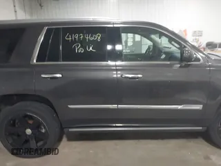 2015 Cadillac Escalade Premium z VIN 1GYS4CKJ8FR308617, wystawiony jako IAAI lot #41974608 z przebiegiem 154 014 mil mil oraz . Historia ofert i sprzedaży dostępna na DreamBid. Obrazek 13.