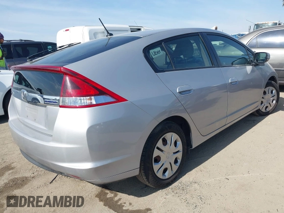 2012 Honda Insight LX с VIN JHMZE2H56CS001570, выставлен на аукционе IAAI как лот 41461236 с пробегом 129 431 миль миль и . История ставок и продаж доступна на DreamBid. Изображение 4.