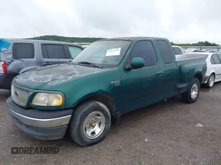 1999 Ford F-150 with VIN 1FTRX07W3XKB82854, listed as a IAAI auction lot 42411358 with Not provided miles and . Bid and sale history available at DreamBid. Image 2.