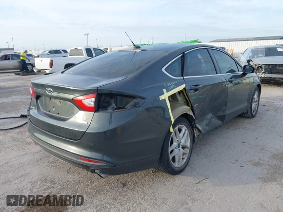 2015 Ford Fusion SE with VIN 3FA6P0HD3FR113551, listed as a IAAI auction lot 41871920 with 69,910 mi miles. Bid and sale history available at carsss.com. Image 4.