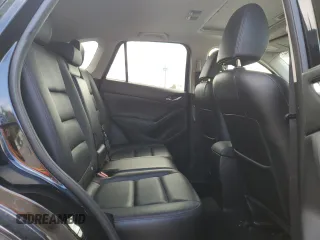 2015 Mazda CX-5 Grand Touring with VIN JM3KE4DY2F0480639, listed as a Copart auction lot 75248594 with 104,652 mi miles and Non Repairable. Bid and sale history available at carsss.com. Image 11.