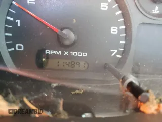 2004 Ford Ranger XLT Appearance with VIN 1FTYR44E84PB61571, listed as a Copart auction lot 87825545 with 114,891 mi miles and Salvage Title. Bid and sale history available at carsss.com. Image 9.