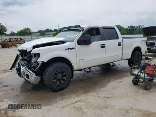 2012 Ford F-150 XL with VIN 1FTFW1ET3CFA97536, listed as a Copart auction lot 60842665 with 136,127 mi miles and Salvage title. Bid and sale history available at DreamBid. Image 1.