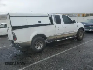 2002 Ford F-150 XL with VIN 1FTRX17LX2KB25894, listed as a Copart auction lot 49283405 with 247,998 mi miles and Salvage title. Bid and sale history available at DreamBid. Image 3.