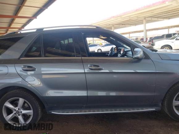 2017 Mercedes-Benz GLE 350 with VIN 4JGDA5JB4HA936040, listed as a IAAI auction lot 42278809 with 80,327 mi miles and . Bid and sale history available at DreamBid. Image 14.