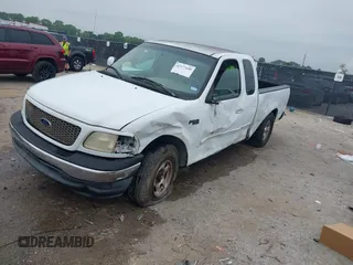 2001 Ford F-150 XL z VIN 1FTZX17281NB02781, wystawiony jako IAAI lot #42377688 z przebiegiem 180 830 mil mil oraz . Historia ofert i sprzedaży dostępna na DreamBid. Obrazek 2.