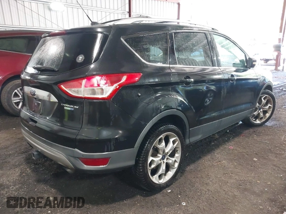 2015 Ford Escape Titanium with VIN 1FMCU9J98FUB00525, listed as a IAAI auction lot 42547989 with 194,040 mi miles and . Bid and sale history available at DreamBid. Image 4.