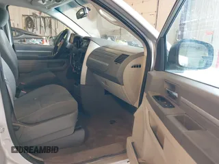 2010 Dodge Grand Caravan SE with VIN 2D4RN4DE8AR173359, listed as a IAAI auction lot 42170689 with 246,553 mi miles and . Bid and sale history available at DreamBid. Image 5.