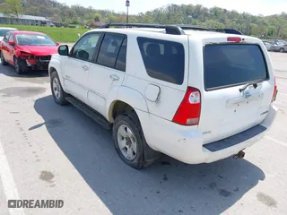 2006 Toyota 4Runner SR5 with VIN JTEBU14R768064604, listed as a IAAI auction lot 42059877 with 166,548 mi miles. Bid and sale history available at carsss.com. Image 3.