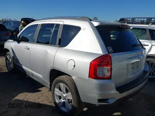 2011 Jeep Compass with VIN 1J4NT1FA4BD139153, listed as a IAAI auction lot 41665481 with 164,412 mi miles. Bid and sale history available at carsss.com. Image 3.