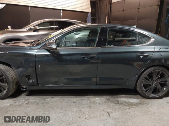 2023 Genesis G70 2.0T with VIN KMTG34TA3PU115553, listed as a IAAI auction lot 41822917 with 35,784 mi miles and . Bid and sale history available at DreamBid. Image 14.
