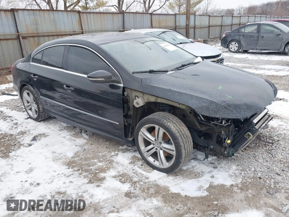 2015 Volkswagen CC Sport with VIN WVWBN7AN6FE819703, listed as a IAAI auction lot 41638624 with 103,785 mi miles and . Bid and sale history available at DreamBid. Image 1.
