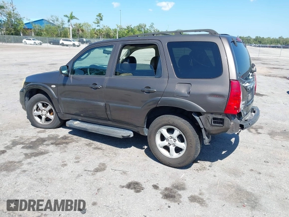 2006 Mazda Tribute i with VIN 4F2YZ02Z36KM29148, listed as a IAAI auction lot 42044163 with 175,786 mi miles and . Bid and sale history available at carsss.com. Image 3.
