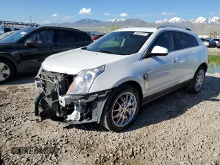 2014 Cadillac SRX Premium Collection z VIN 3GYFNGE31ES680993, wystawiony jako Copart lot #54899285 z przebiegiem 141 369 mil mil oraz Szkoda całkowita • Salvage title. Historia ofert i sprzedaży dostępna na DreamBid. Obrazek 1.