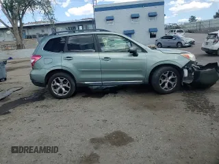 2015 Subaru Forester Touring z VIN JF2SJAUC9FH489669, wystawiony jako Copart lot #55339775 z przebiegiem 114 814 mil mil oraz Szkoda całkowita • Salvage title. Historia ofert i sprzedaży dostępna na DreamBid. Obrazek 14.
