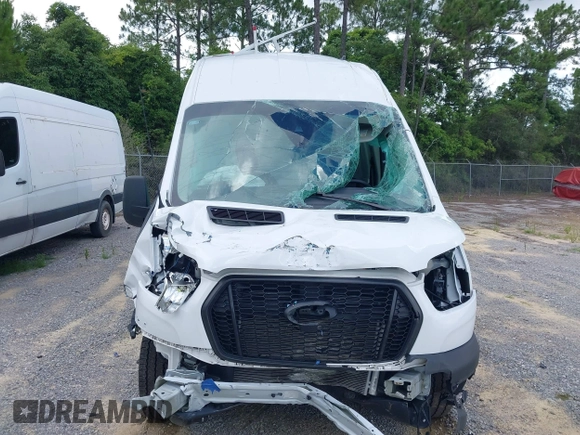 2024 Ford Transit Cargo with VIN 1FTBR3X86RKA46123, listed as a IAAI auction lot 42490695 with 13,258 mi miles and . Bid and sale history available at DreamBid. Image 12.