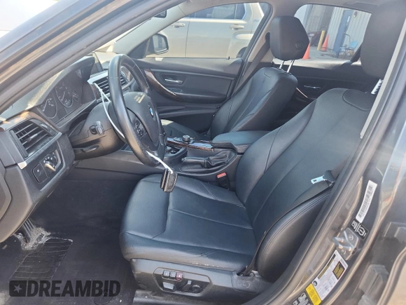 2013 BMW 3 Series 320i xDrive with VIN WBA3C3C51DF980707, listed as a Copart auction lot 63655825 with 148,487 mi miles and Clean title. Bid and sale history available at DreamBid. Image 7.